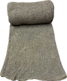 Roll of Ninety7 jute netting partially unrolled