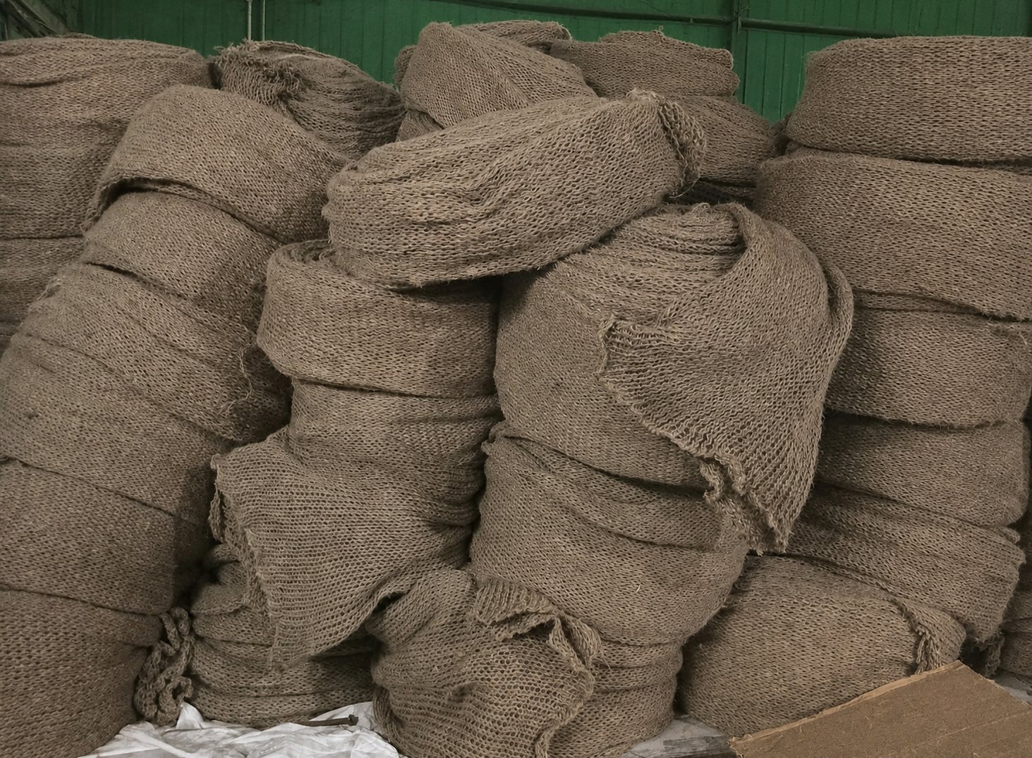 Stacks of Ninety7 jute sock rolls