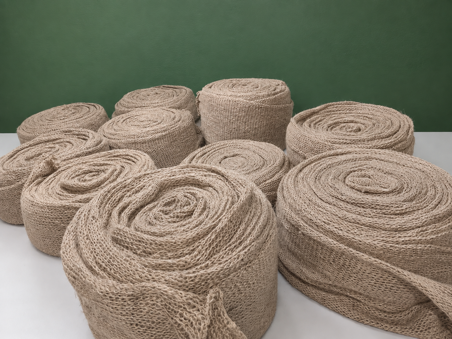 Ninety7 jute netting rolls displayed on a clean table